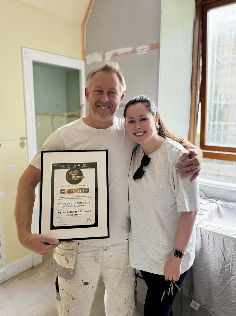 Robert, the Square Lettings decorator, and Emma holding a finalist certificate for Scotland’s Best Painting and Decorating Company